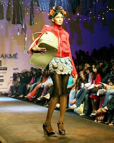 Carol Gracias displays a creation by Indian designer Sabyasachi ...