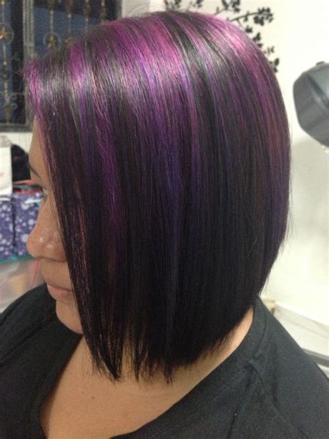 Purple highlights done bu Curl Up & Dye.