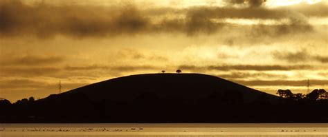 Download wallpaper 2560x1080 hill, trees, sunset, sea, sky dual wide ...