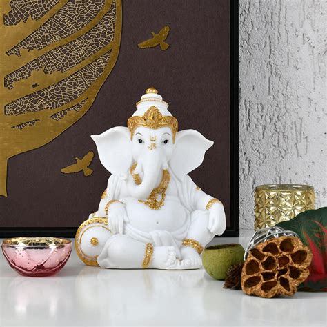 Buy Ganesha Relaxing Polyresin Showpiece (White & Gold) Online ...