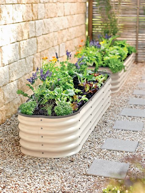A stylish step up from popular galvanized trough planters, this eye ...