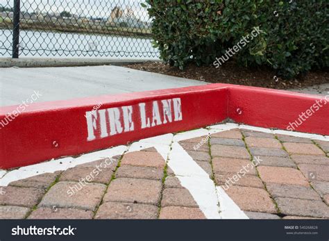 Painted Red Curb Fire Lane Stock Photo (Edit Now) 540268828