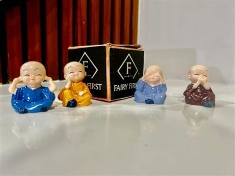 Buy Homesutraa Hanging Legs Love Showpiece Family Sitting Dolls ...