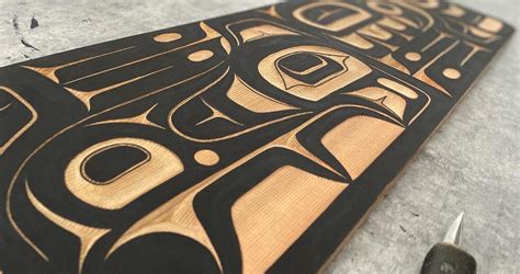 Unraveling the Timeless Tale of Tlingit Totem Carving: Honoring History, Culture, and Identity