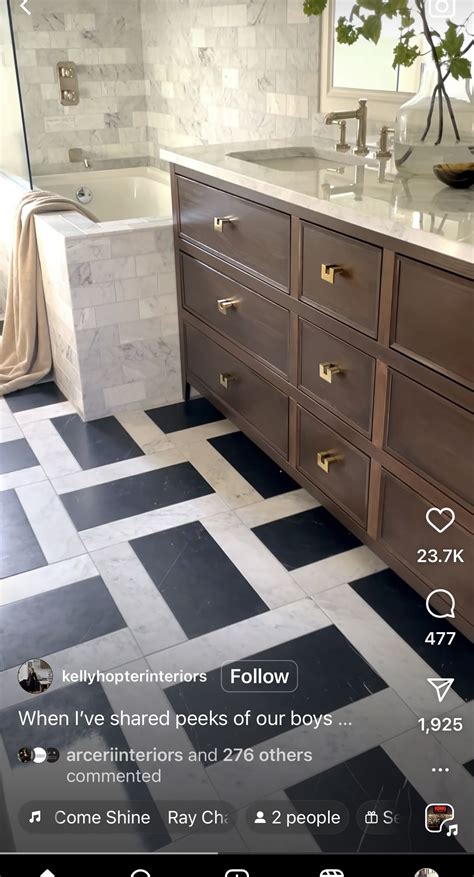 Black and White Bathroom with Stylish Floor Tiles
