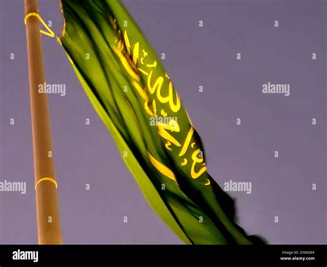 The national flag of Saudi Arabia kingdom, a green background with Arabic inscription and a ...