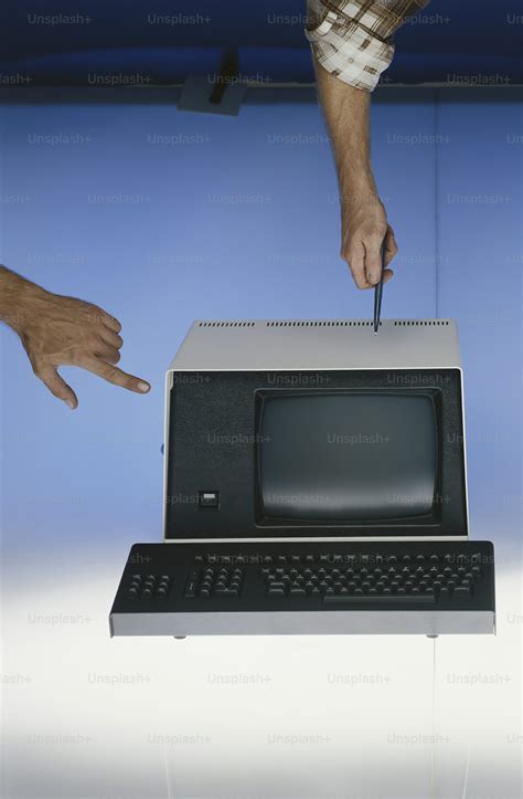 Hand Next to Broken Computer 的图像结果