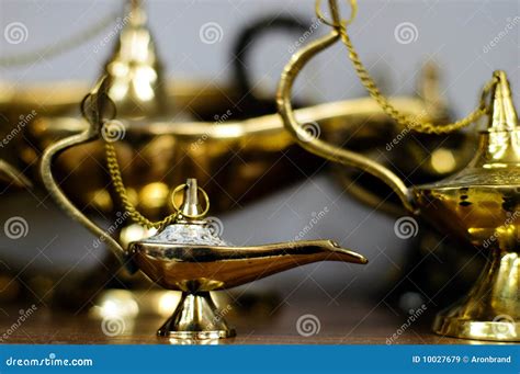Ancient Aladdin's Magic Lamp. Silver Genie Lamp On Wooden Table. Old ...