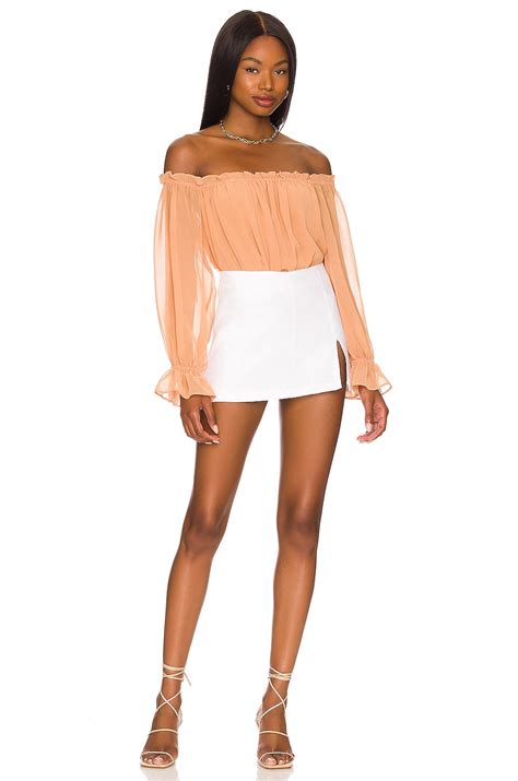 1. STATE Off The Shoulder Peplum Blouse in Toasted Nut | REVOLVE