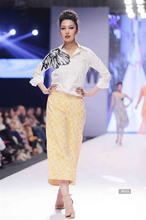 A Pakistani model presents a creation by designer Ali Xeeshan during ...