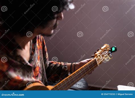 Close Up of a Young Mexican Musician is Tuning His Jarana Guitar at Home Stock Image - Image of ...