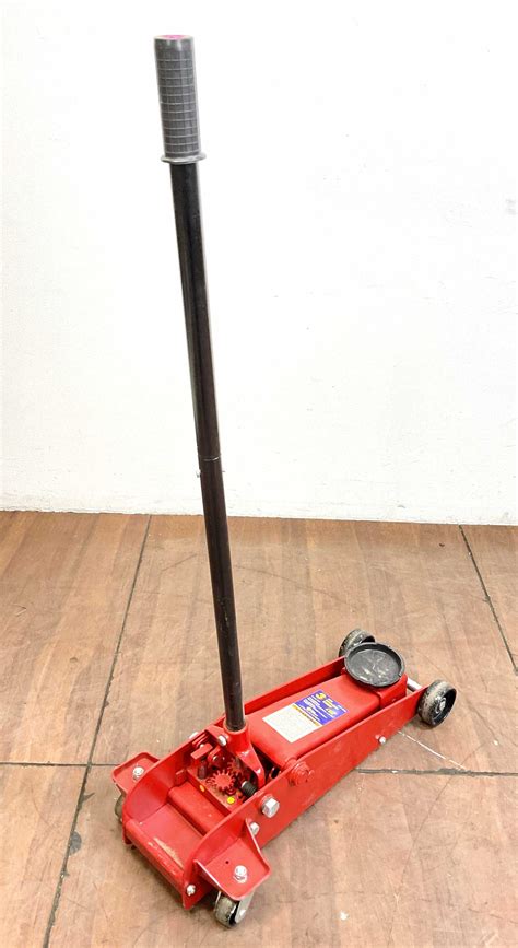 Lot - Napa 3 Ton Hydraulic Floor Jack