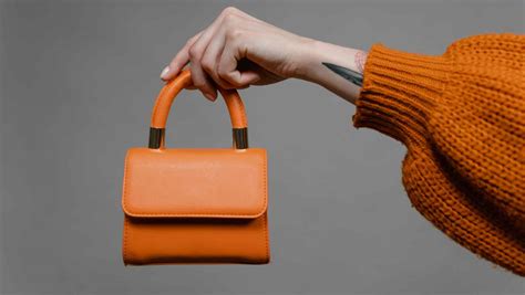 Orange clutch on sale bag topshop