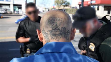 Surenos street gang tied to accused California cop killer has history ...