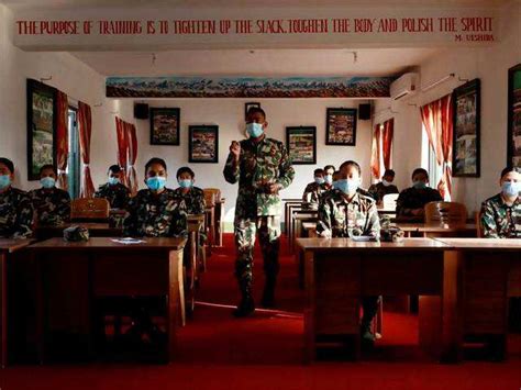Female soldiers at army barracks - Nepali women soldiers break glass ...