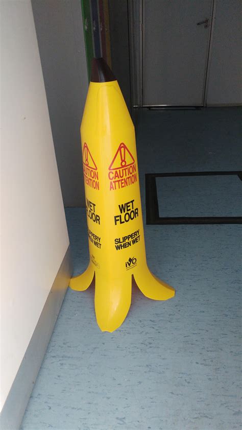 Wet floor sign shaped like banana peel... | Wet floor signs, Wet floor, Wet