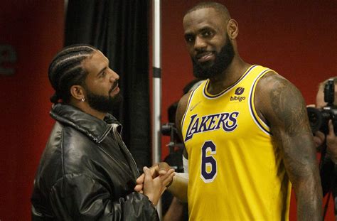 Drake Walks Out With LeBron James & Bronny At Los Angeles Tour Stop