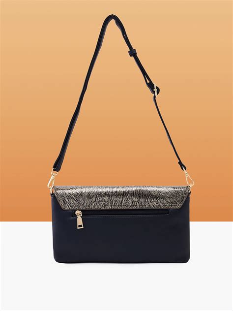 Buy Caprese Ava Large Black Clutch @ Rs.2499 | Caprese Bags