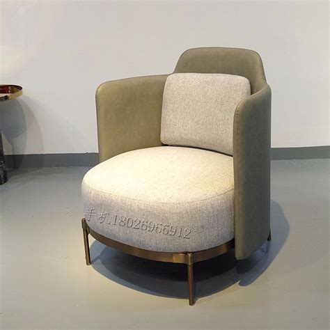 北欧单人铁艺沙发椅现代简约小户型设计师意式轻奢墨绿色布艺沙发