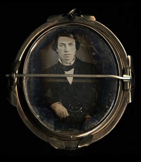 Daguerreotype of a young man mounted on the back of a brooch, circa ...