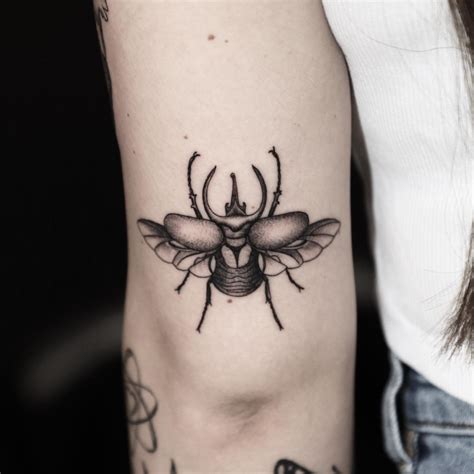 Nik Moore Scarab Tattoos