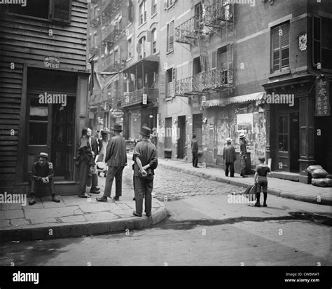 Pell Street in New York City's Chinatown with several Chinese men in ...