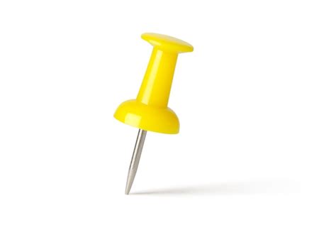 Yellow pin isolated on a white background | Premium Photo