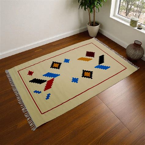 Dhaaga Weaves | Indian Handloom Handcrafted Dhurries & Cushion Covers