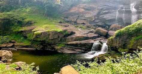 Bomburu Ella Waterfall Is Amidst Lush Greenery And Serene Waters