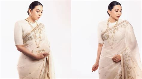 Karisma Kapoor steals spotlight in ivory saree at 100 years of Raj ...