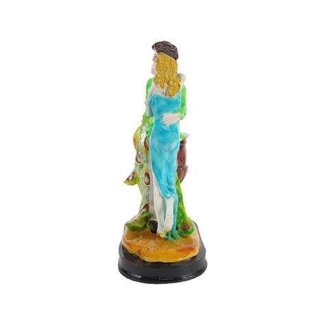 Buy couple showpiece online — Wonderland Garden Arts and Craft