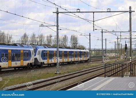 Flirt Local Commuter Train on Track in Lage Zwaluwe Editorial Photo ...