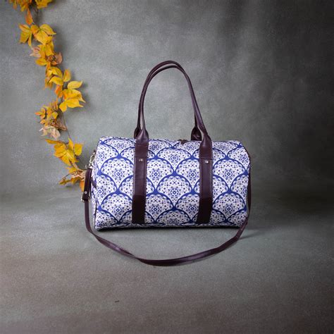 Water-Resistant Travel Bags White with Blue Prints. – lakshya bags