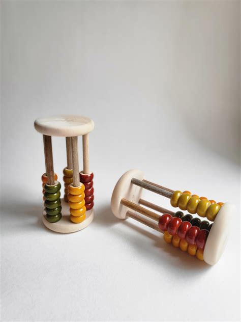 Gulab Tribe Handcrafted Wooden Abacus Rolling Rattle – The Mom Store
