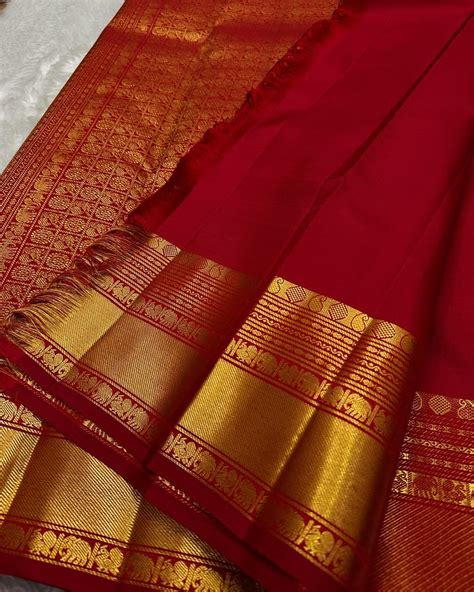 Classic Red Banarasi Silk Saree with Gold Zari Elephant Motif & Grand ...