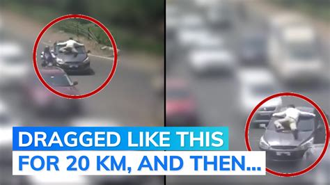 On cam: cop dragged on car being driven by man allegedly high on drugs ...