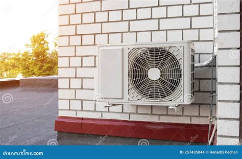 Wall-mounted Industrial Air Conditioner on a Brick Wall of a Building ...