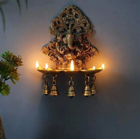 Buy ARTSIKIA Brass Ganesha Deep Hanging with Bells | 5 Wicks Diya with ...