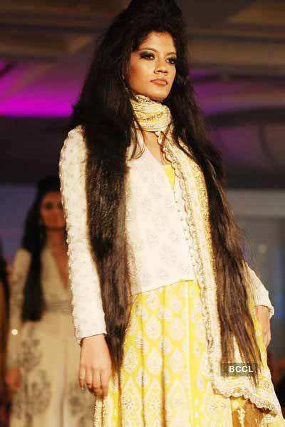 A model walks the ramp for designer Krishna Mehta during India Princess ...