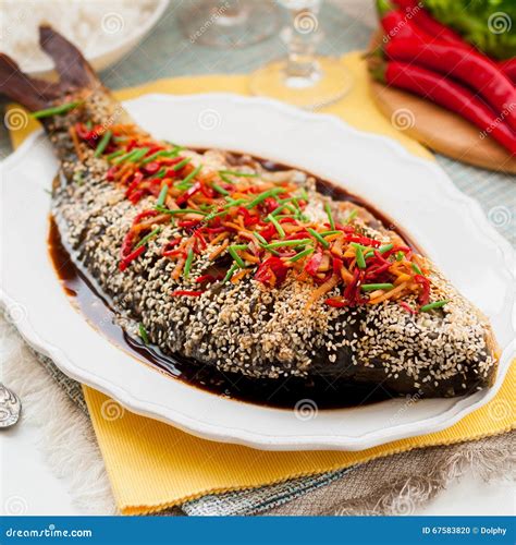 Asian Style Baked Fish with Chili, Ginger and Soy Sauce Dressing Stock ...