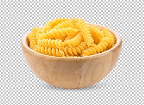 Pile of raw macaroni in wood bowl isolated on alpha layer | Premium PSD