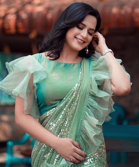 Pista green organza georgette sequence embroidered saree