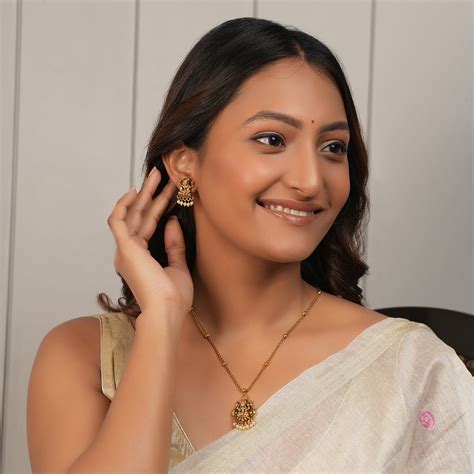 Stunning maa lakshmi antique gold pendant set with lakshmi earring ...