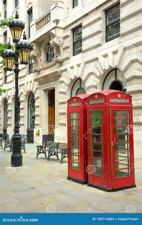 Red English Phone Booths in a Street Stock Photo - Image of english ...