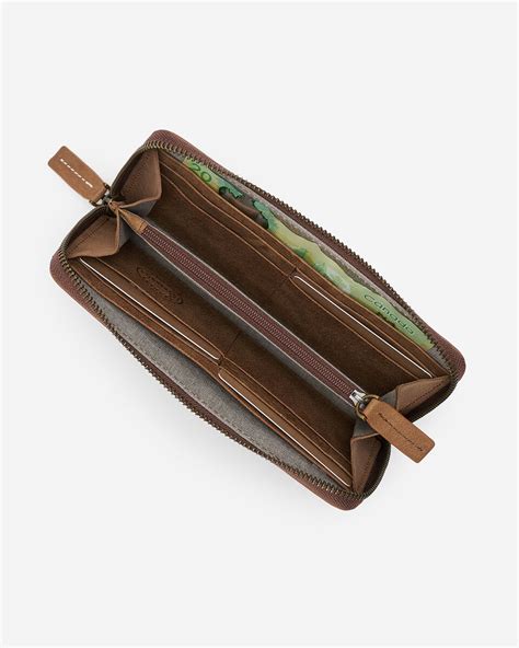 Zip Around Clutch Tribe | Roots