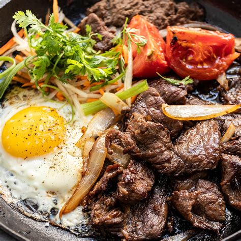 Vietnamese Sizzling Steak and Eggs (Bò Né) — Vicky Pham