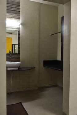 Rooms , Hotel Neelayam Ozar near District - Pune, Lift & Generator ...