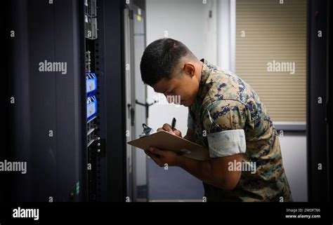 Private First Class Erwin C. Mariano, a Data Systems Administrator at ...