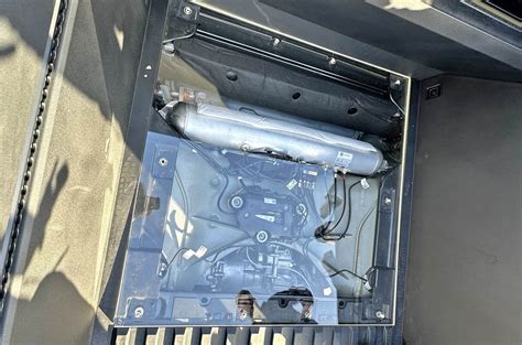 Air Suspension Pump / Reservoir Tank location below the Cybertruck bed ...