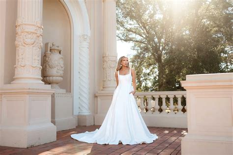 Minimalist Chic Modern A-Line Wedding Dress with Shoulder Straps and Pockets